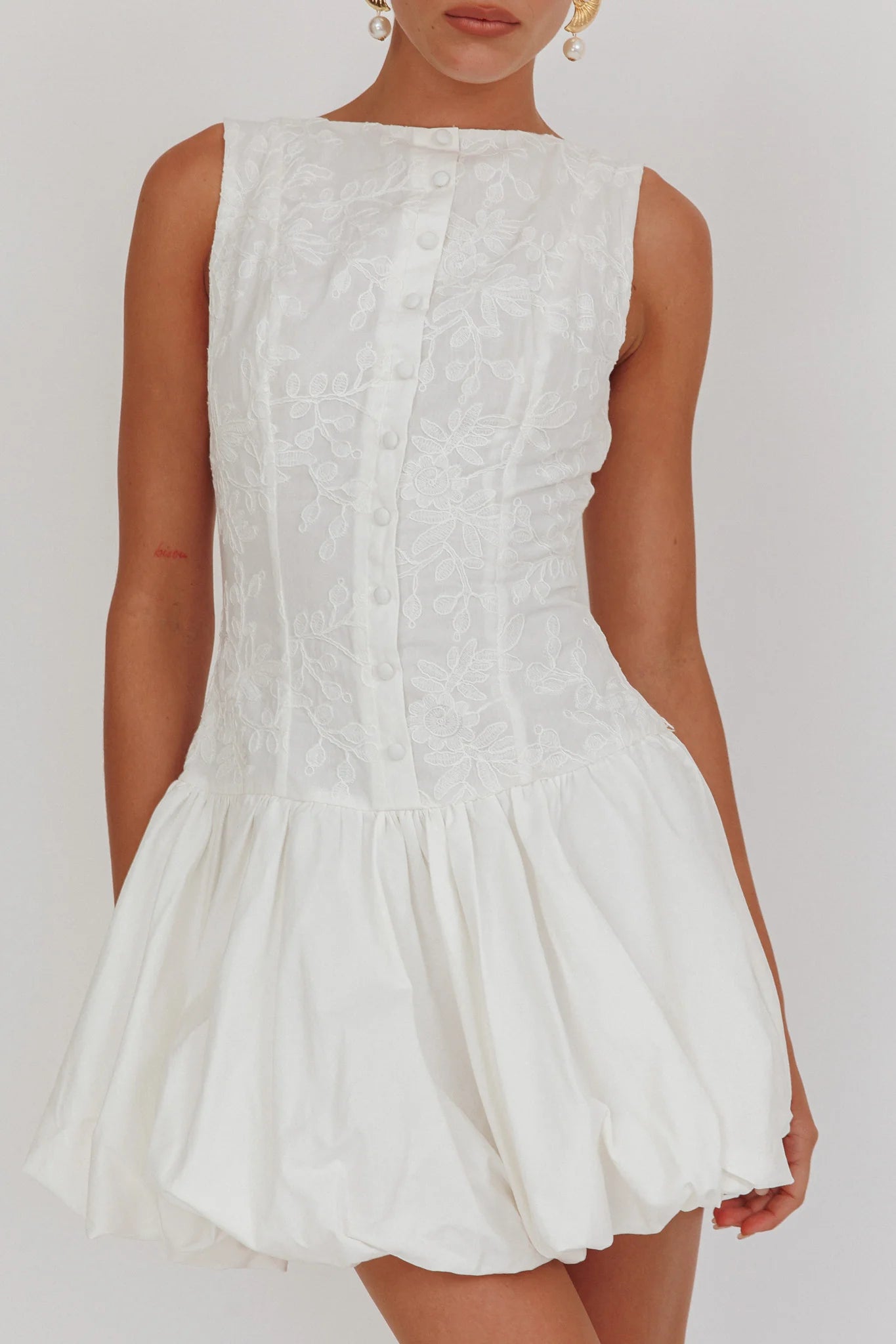 Opulent Sleeveless Bubble Hem Mini Dress Embroidered White